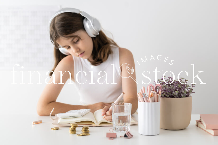 Financial Stock Images - Working out taxes from home-Desktop items.