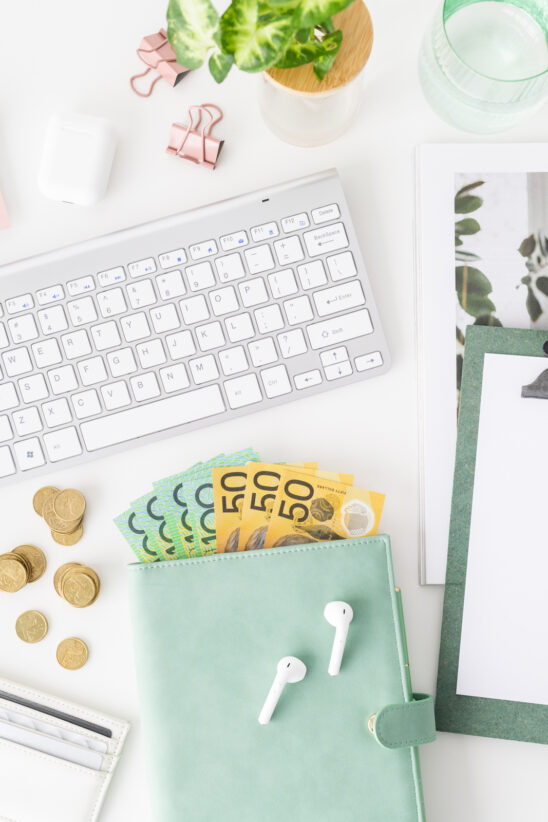 Financial Stock Images - Working from home-Flatlay-Currency-coins-desktop.
