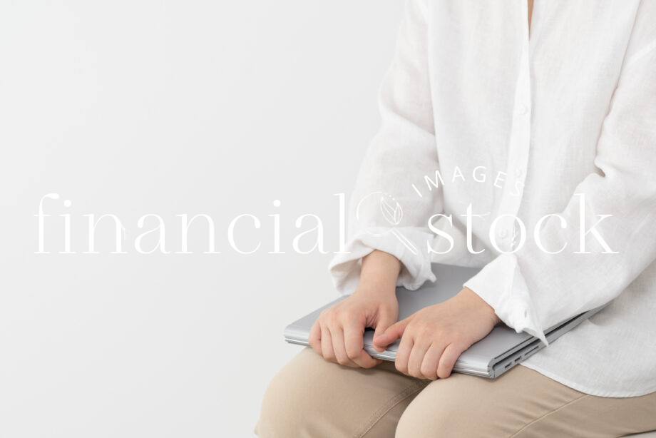 Financial Stock Images - Woman working from home copyspace-beige-laptop, typing, studying, female.
