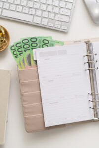Financial Stock Images - Woman working from home with an office diary