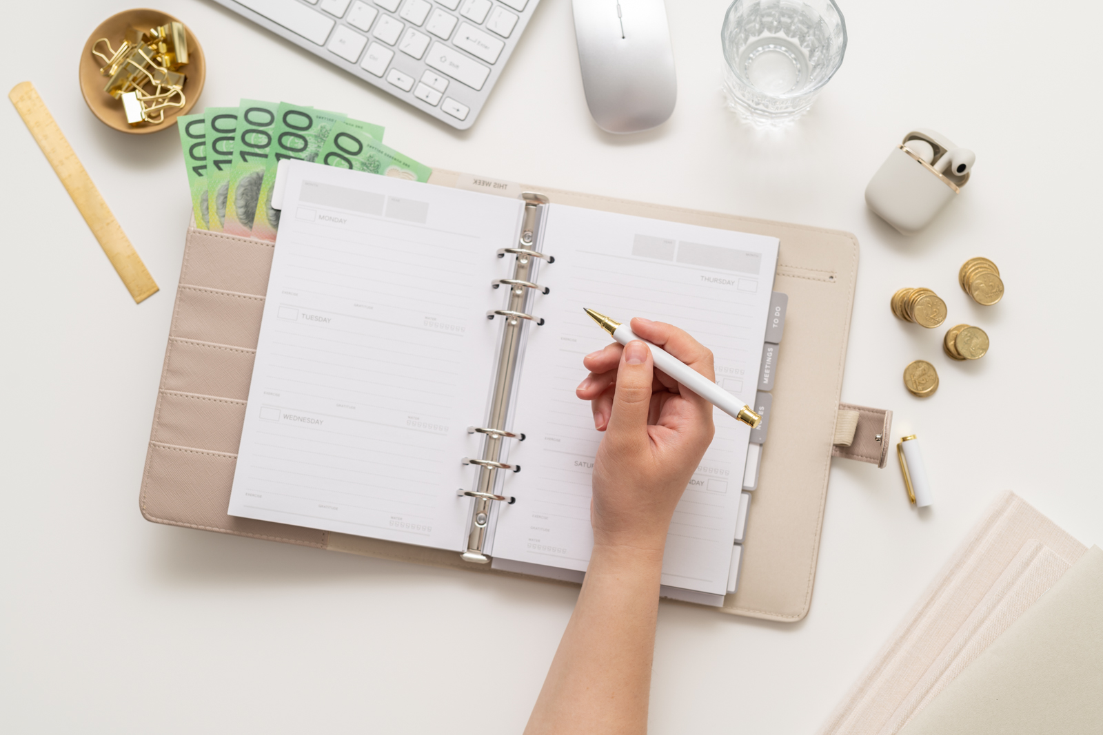 Financial Stock Images - Woman working from home with an office diary