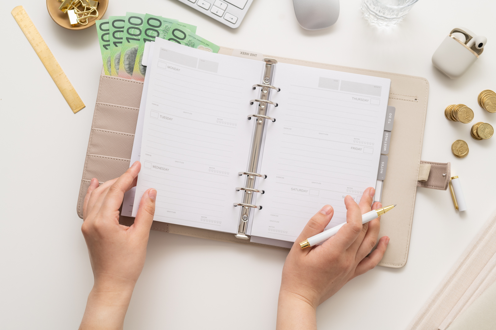 Financial Stock Images - Woman working from home with an office diary