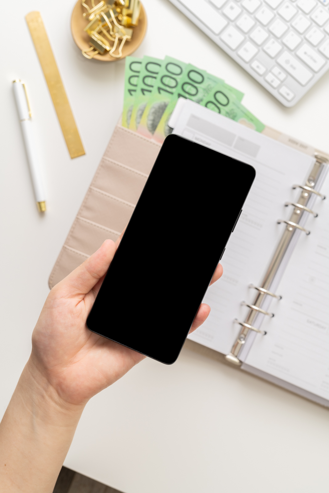 Financial Stock Images - Woman working from home with a mobile phone