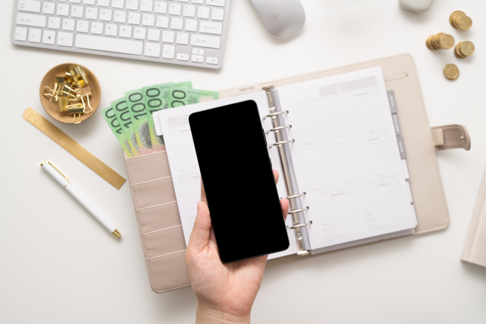 Financial Stock Images - Woman working from home with a mobile phone