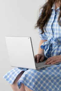 Financial Stock Images - Working from home using a laptop for business..