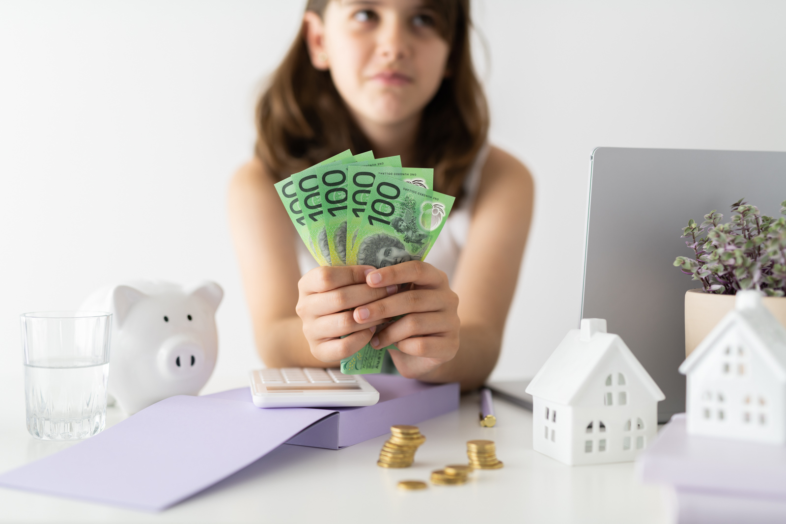 Financial Stock Images - Young female entrepreneur working out her finances