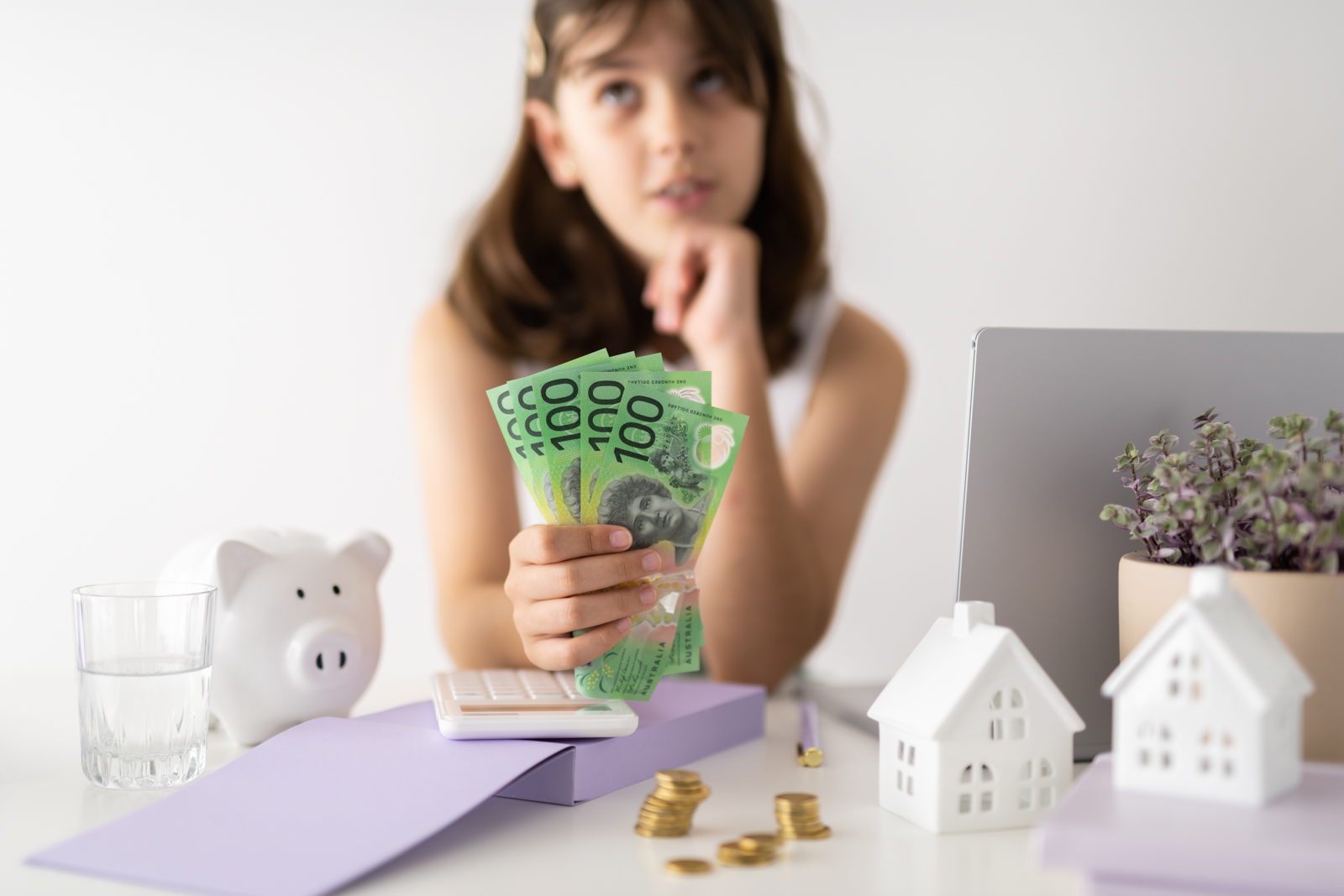 Financial Stock Images - Young female entrepreneur working out her finances