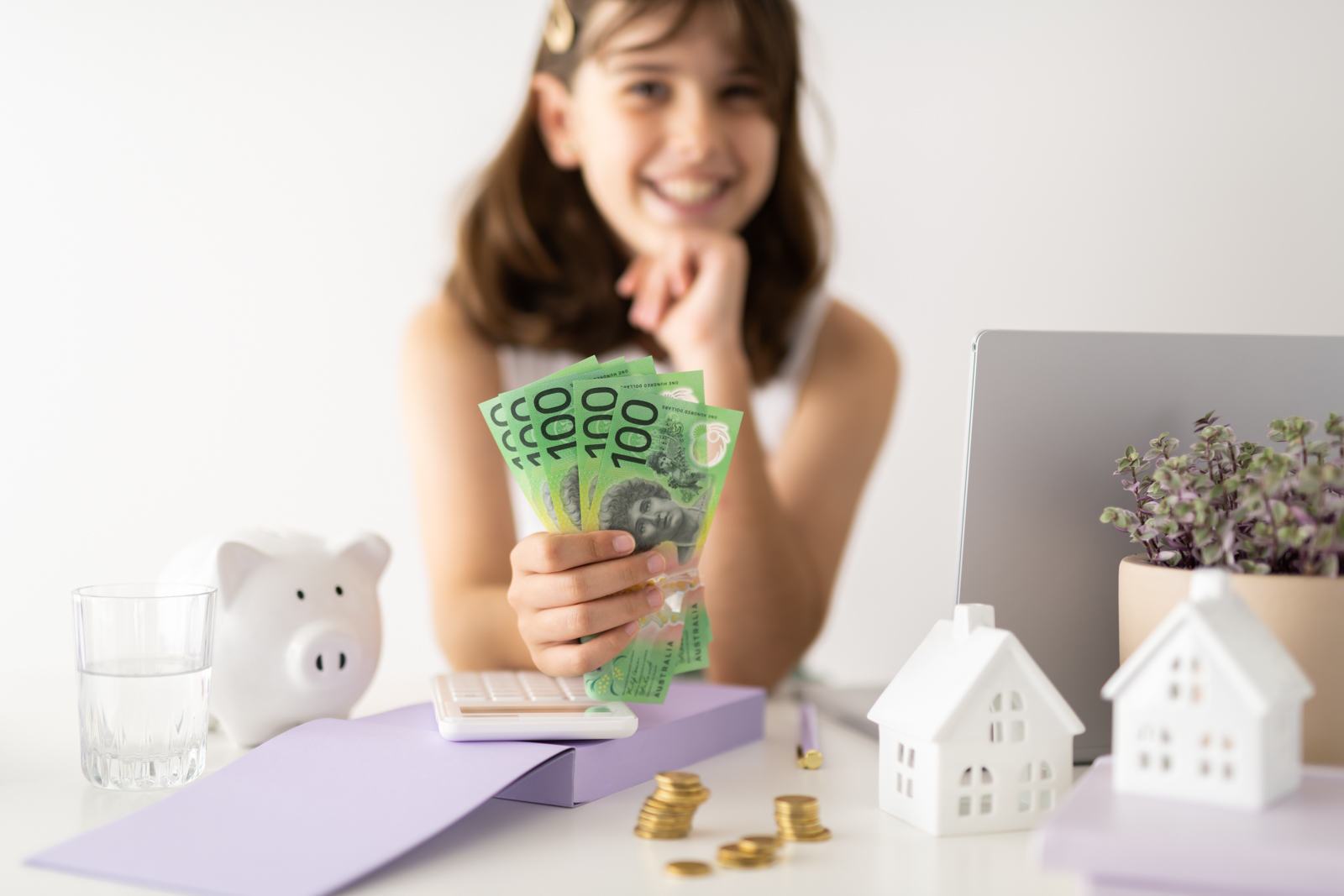 Financial Stock Images - Young female entrepreneur working out her finances