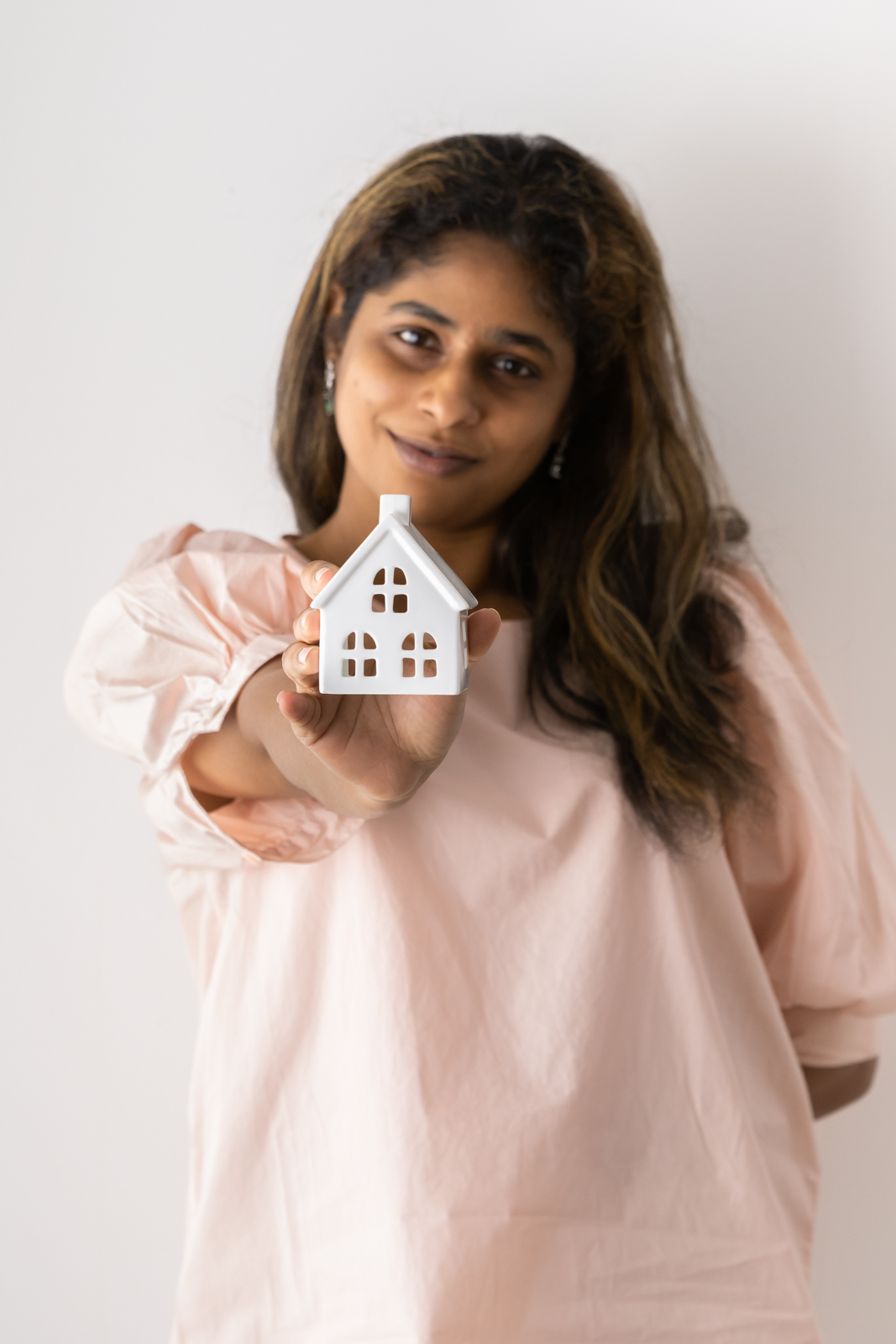 Financial Stock Images - Female entrepreneur working out her home finances.