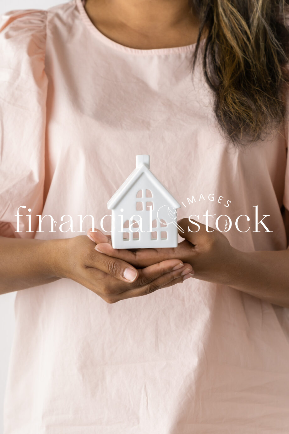 Financial Stock Images - Female entrepreneur working out her home finances.