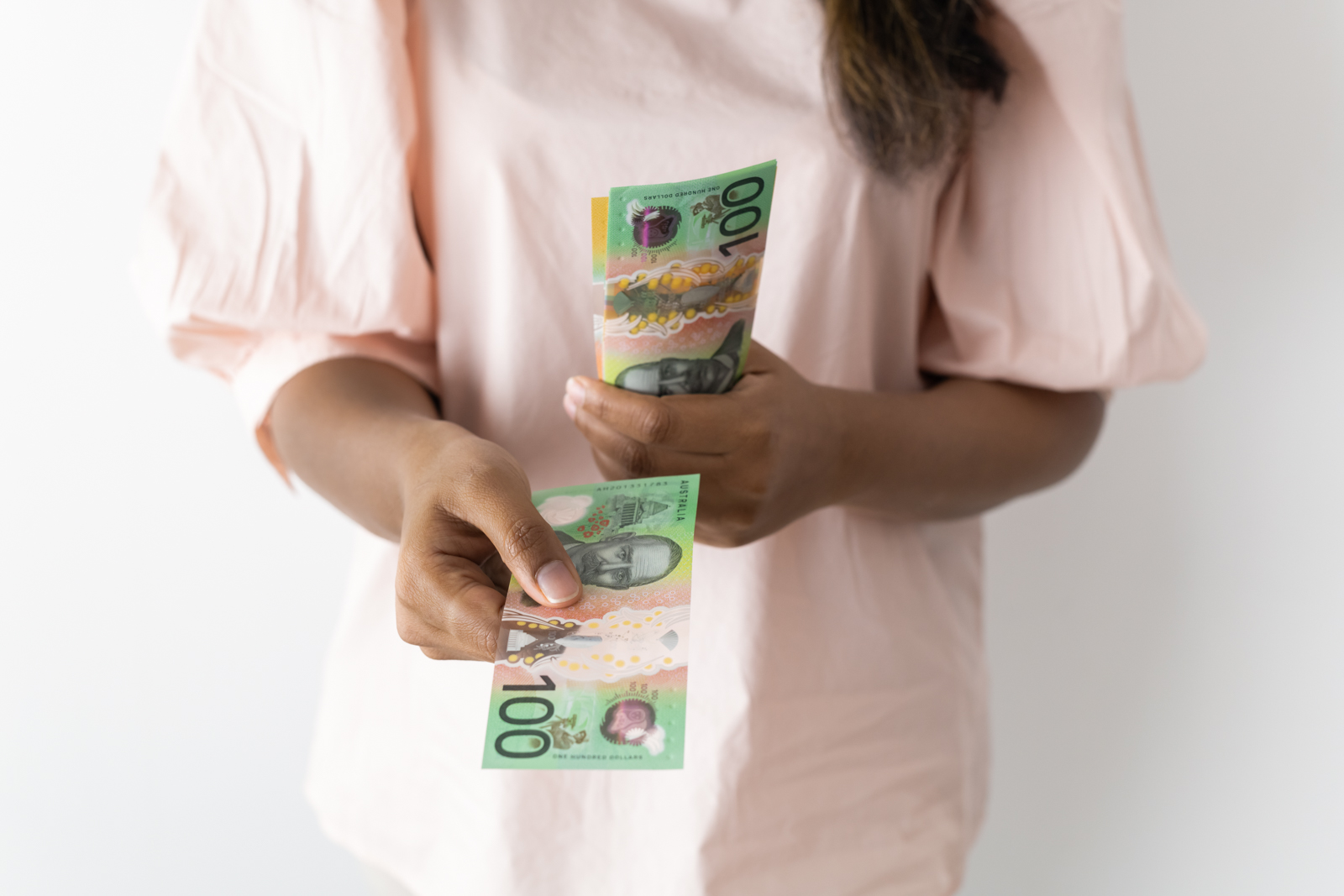 Financial Stock Images - Female entrepreneur working out her finances.