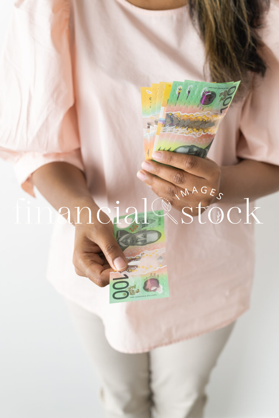 Financial Stock Images - Female entrepreneur working out her finances.