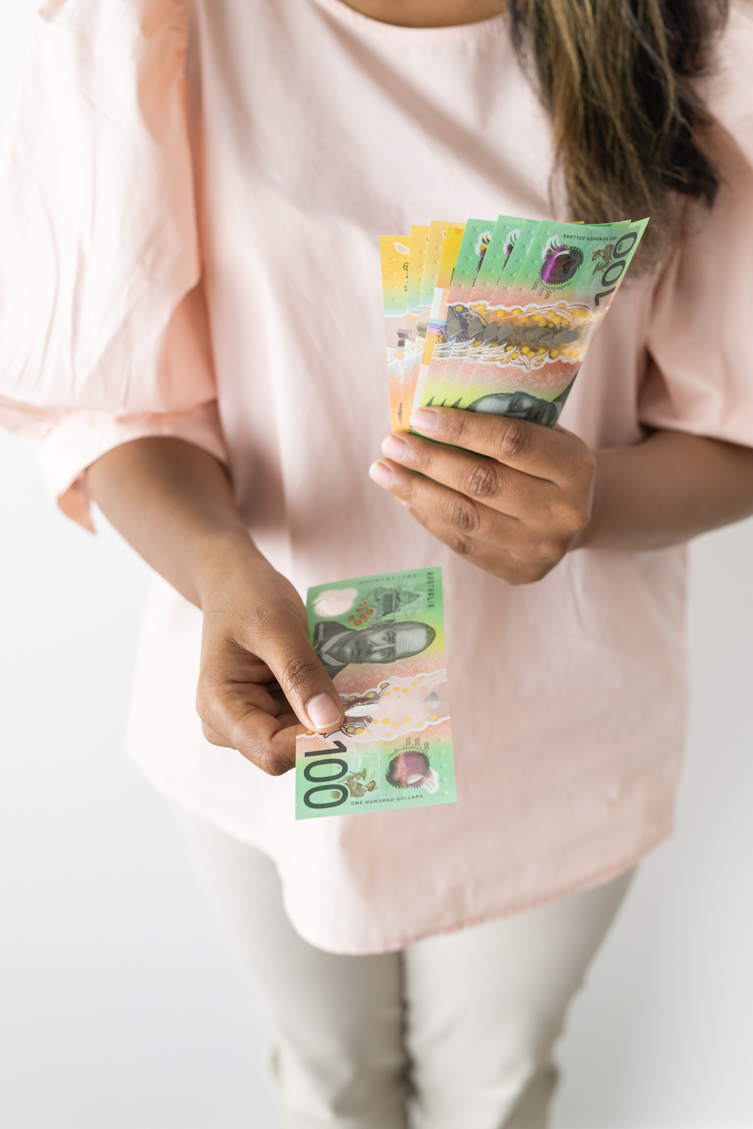 Financial Stock Images - Female entrepreneur working out her finances.