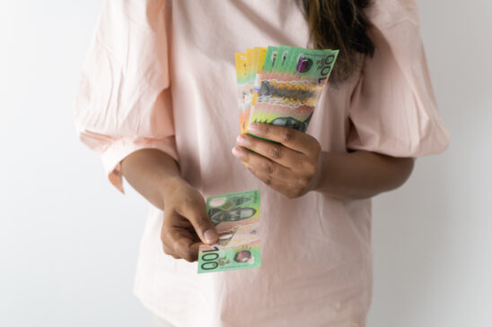 Financial Stock Images - Female entrepreneur working out her finances.