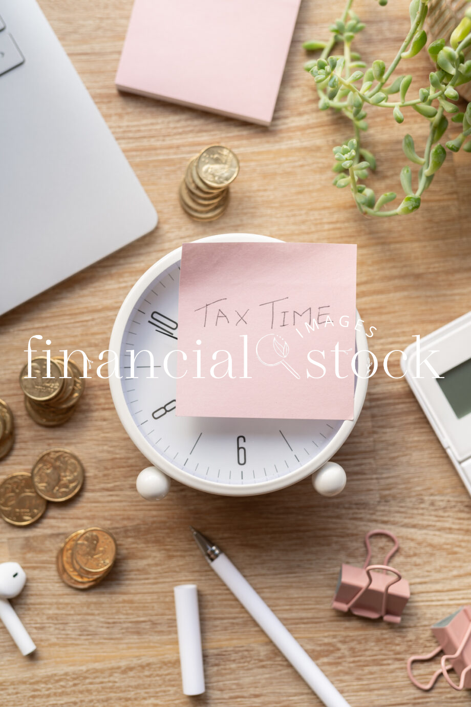 Financial Stock Images - Working out taxes from home.